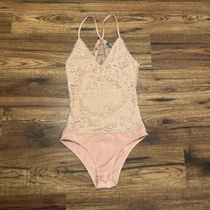 Pink lace bodysuit